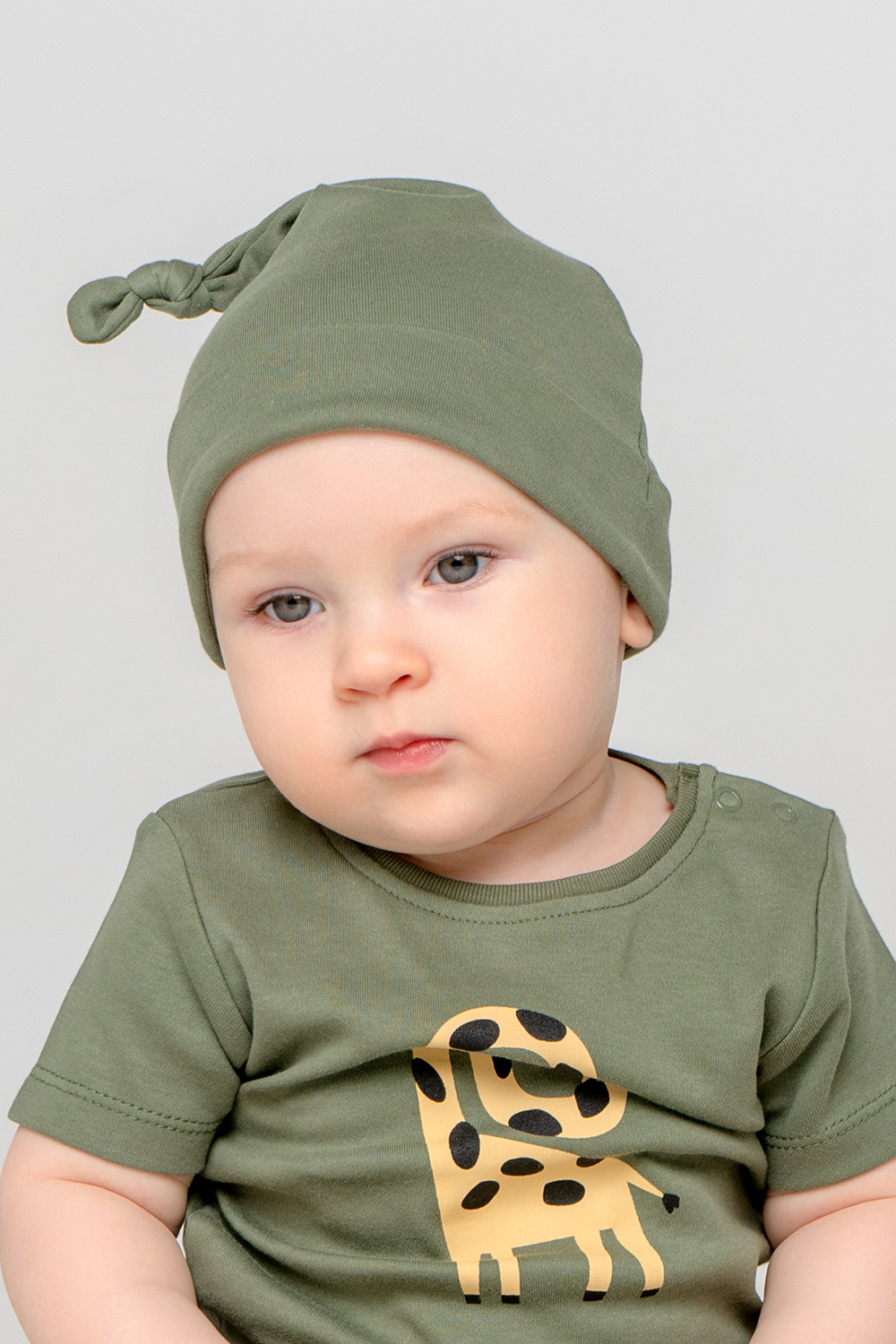 картинка Шапка для мальчика Crockid К 8036 зеленый (веселые жирафы) я108 от магазина детских товаров ALiSa